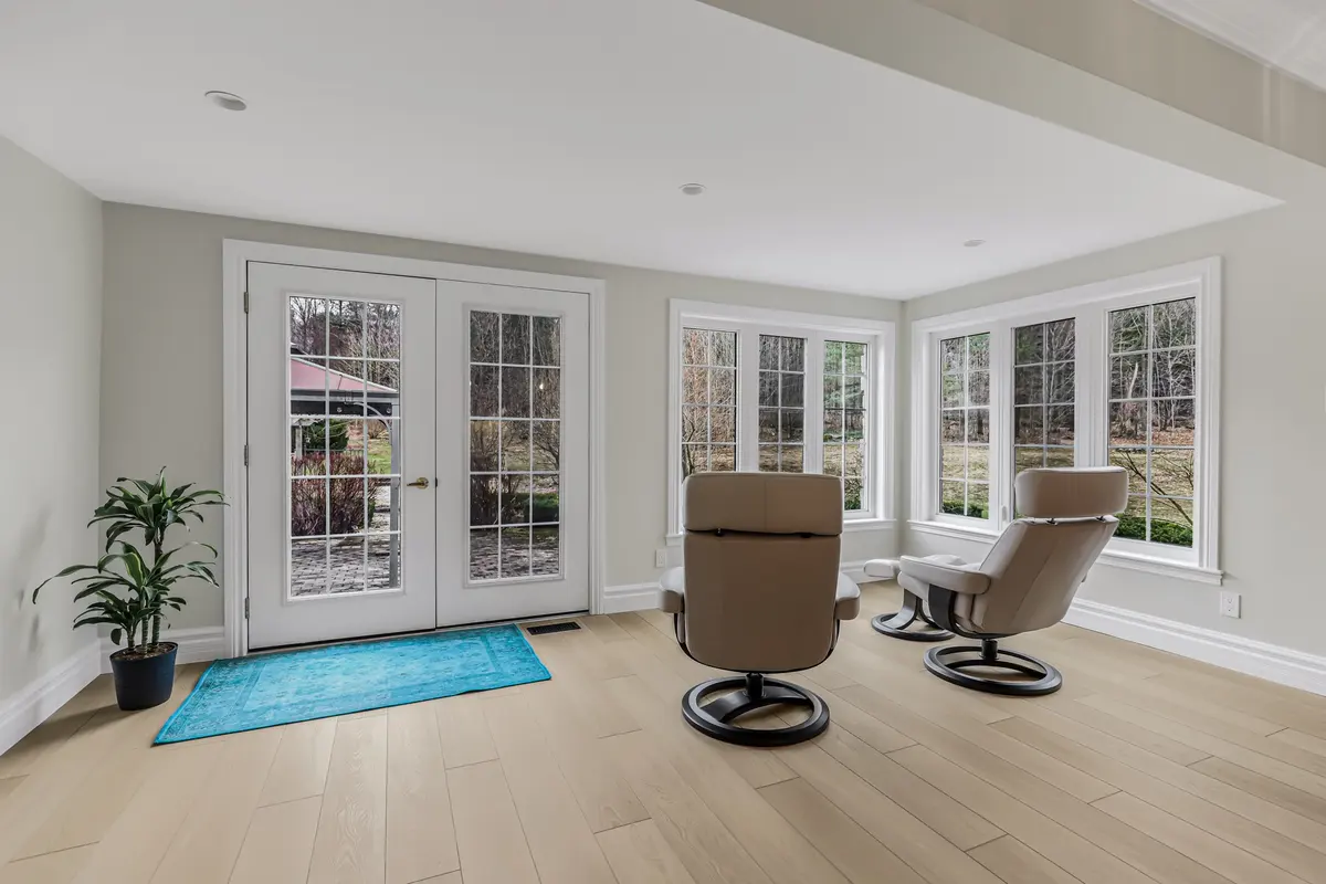 A finished living and dining space with coordinated paint, trim and millwork.